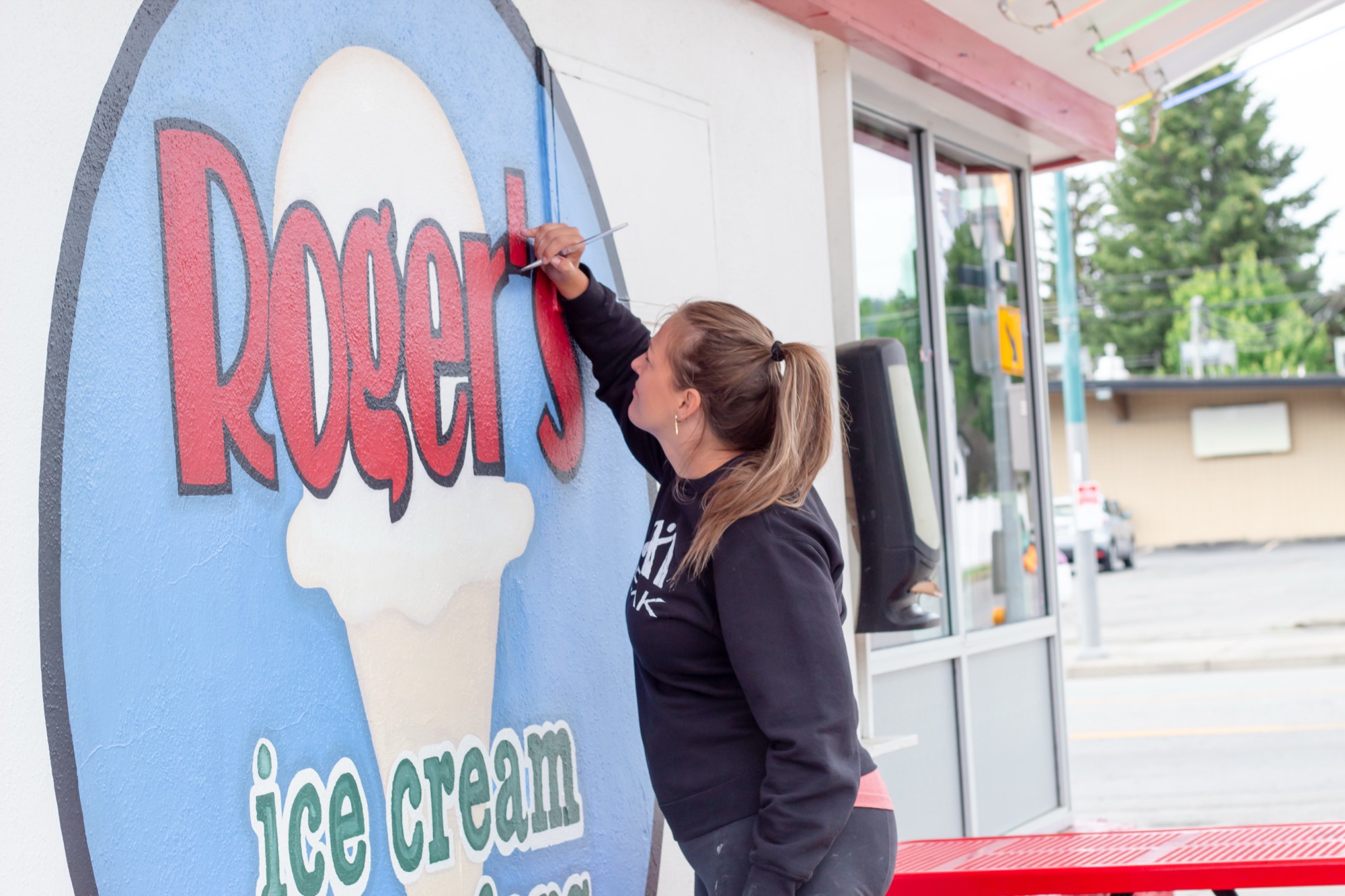 Small business branding photographer North Idaho sign painter at work